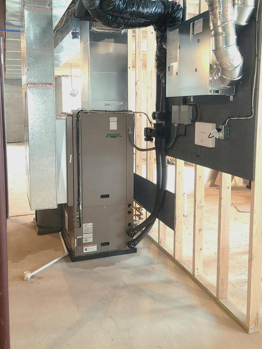 Geostar geothermal indoor unit with ductwork in a Monroe County mechanical room