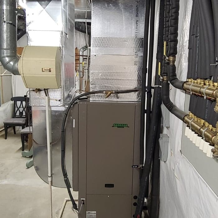 Water-to-air geothermal heat pump installed in a Rochester-area home